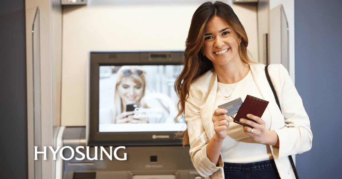 women smiling at digital desk